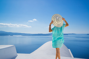 Image showing Young woman on holidays, Santorini Oia town 