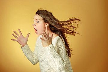 Image showing Portrait of young woman with shocked facial expression