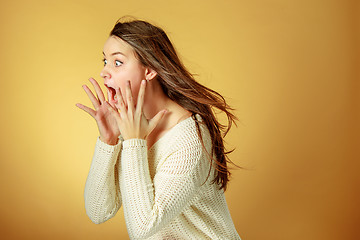 Image showing Portrait of young woman with shocked facial expression