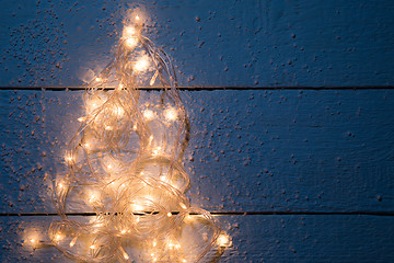 Image showing Christmas card with luminous festoon