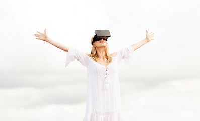 Image showing woman in virtual reality headset outdoors