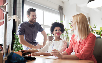 Image showing happy creative team in office