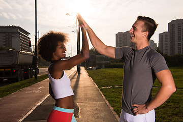 Image showing multiethnic group of people on the jogging