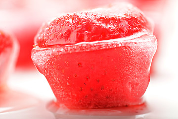 Image showing Strawberry in ice cube closeup