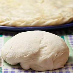 Image showing Pieces of dough and pie