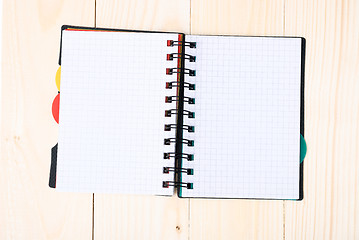 Image showing notepad with pen isolated