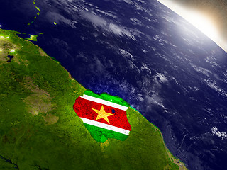 Image showing Suriname with flag in rising sun