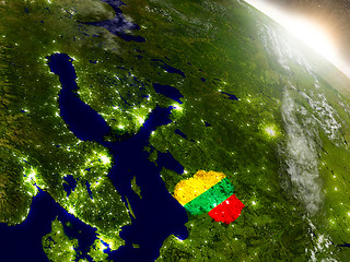 Image showing Lithuania with flag in rising sun