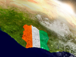 Image showing Ivory Coast with flag in rising sun