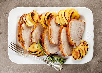 Image showing roasted pork slices on white plate