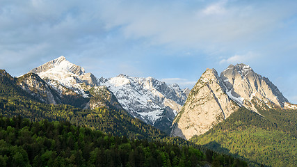 Image showing Springtime morning snowy Alps mountains panoramic scenic view