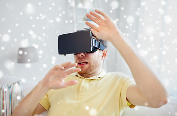 Image showing young man in virtual reality headset or 3d glasses