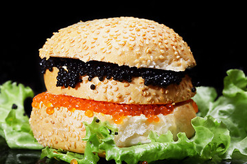 Image showing Caviar sandwich on lettuce