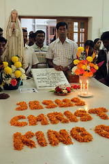 Image showing Pilgrims pray beside the tomb of Mother Teresa in Kolkata, West Bengal, India 