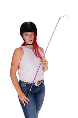Image showing A horseback rider woman with helmet.
