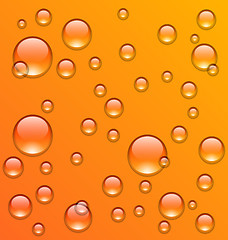 Image showing Clean water droplets on orange surface