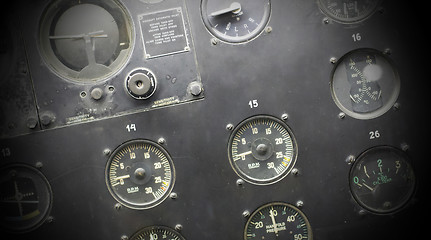 Image showing Different meters and displays in an old plane