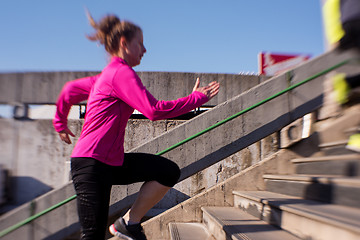 Image showing woman  stretching before morning jogging