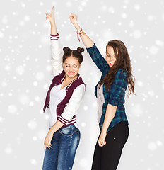 Image showing happy smiling pretty teenage girls dancing