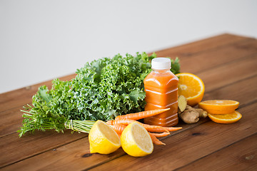 Image showing bottle with carrot juice, fruits and vegetables