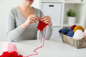 Image showing woman hands knitting with needles and yarn