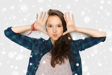 Image showing happy teenage girl making face and having fun