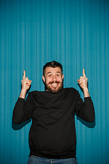 Image showing Portrait of young man with shocked facial expression