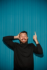 Image showing Portrait of young man with shocked facial expression