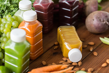 Image showing bottles with different fruit or vegetable juices