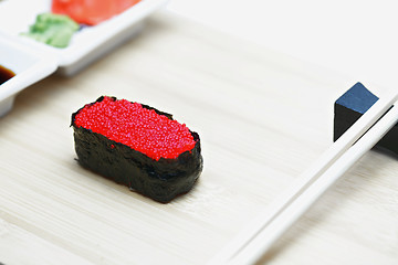 Image showing Tobiko sushi on wood