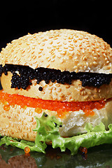 Image showing Caviar sandwich on leaf