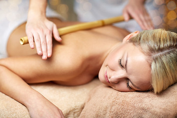 Image showing close up of woman lying and having massage in spa