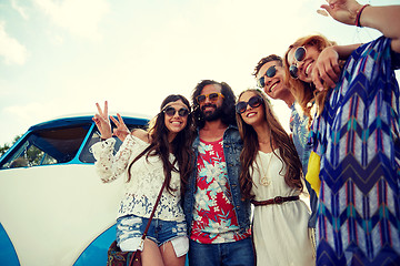 Image showing hippie friends over minivan car showing peace sign