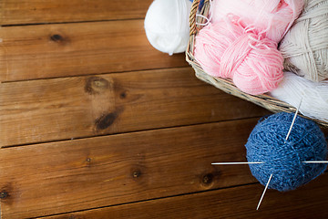 Image showing basket with knitting needles and balls of yarn