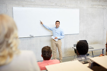 Image showing group of students and teacher at lecture