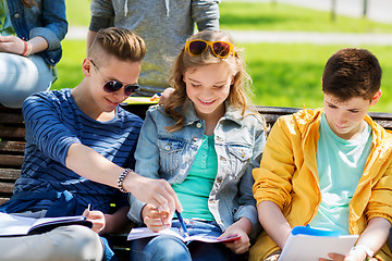 Image showing group of students with notebooks at school yard