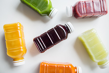 Image showing bottles with different fruit or vegetable juices