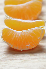 Image showing Tangerine slices in a row