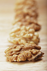 Image showing Row of walnuts