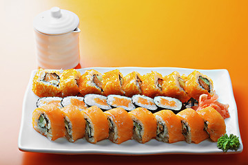 Image showing Salmon rolls and saucer