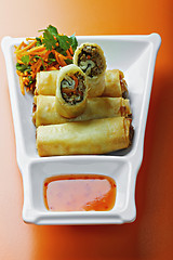 Image showing Seafood spring rolls in a plate