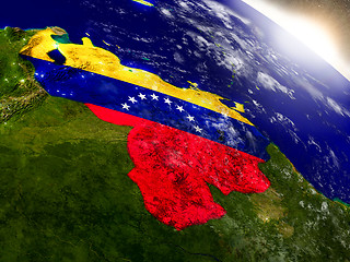 Image showing Venezuela with flag in rising sun
