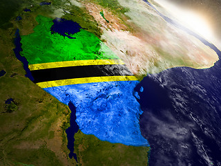 Image showing Tanzania with flag in rising sun