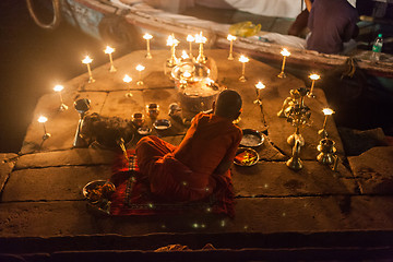 Image showing Boy with offerings to the Ganges