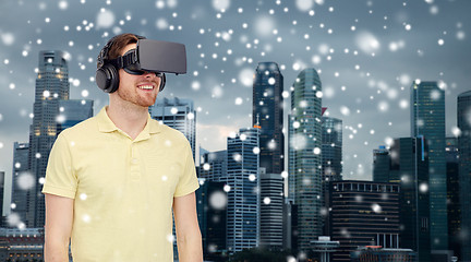 Image showing happy man in virtual reality headset or 3d glasses