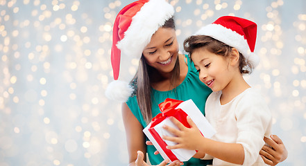 Image showing happy mother and child girl with gift box