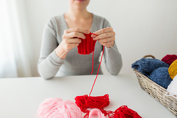 Image showing woman hands knitting with needles and yarn