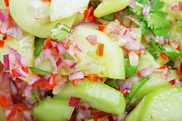Image showing Cucumber and onions salad closeup