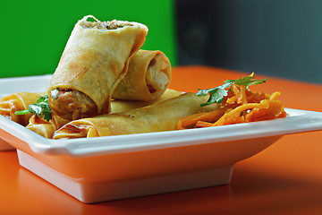 Image showing Spring rolls on a cafe table