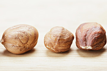 Image showing Three hazelnuts